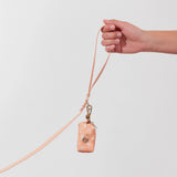 Shop Sunny Tails Peach Smiley Waste Bag Holder